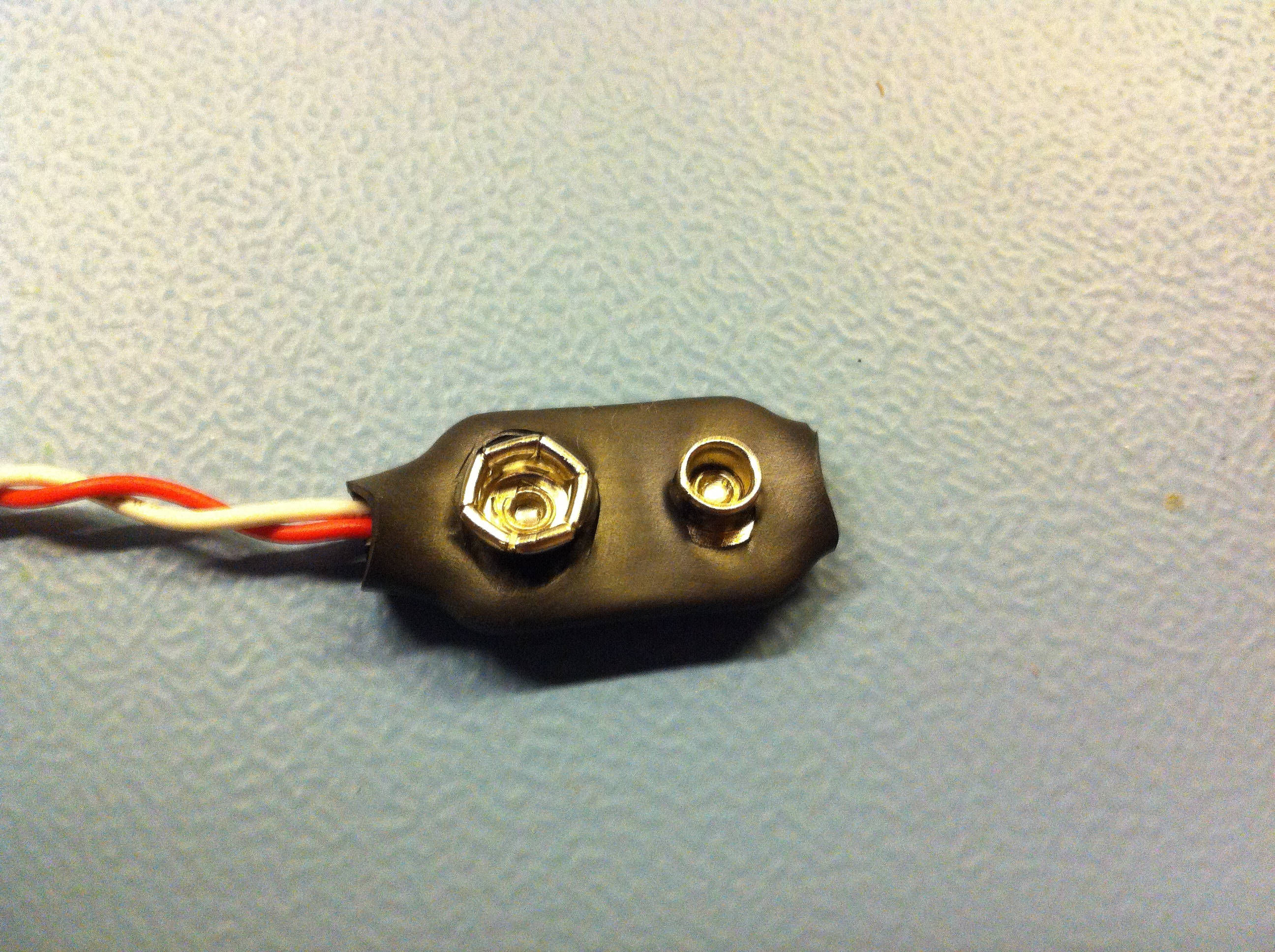broken 1.5 volt battery clip